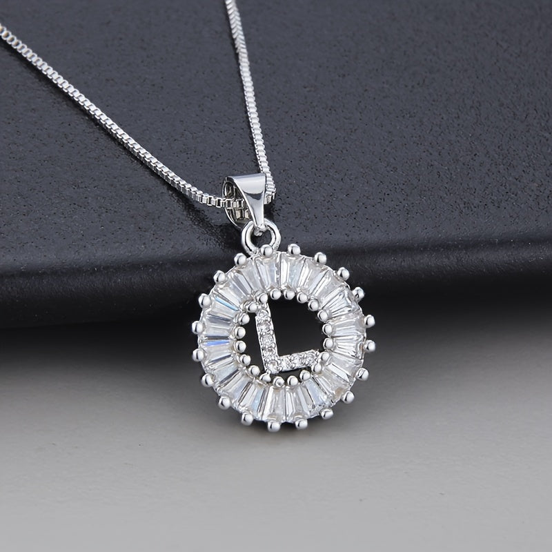 Κολιέ λευκόχρυσο με μονόγραμμα και ζιργκόν
