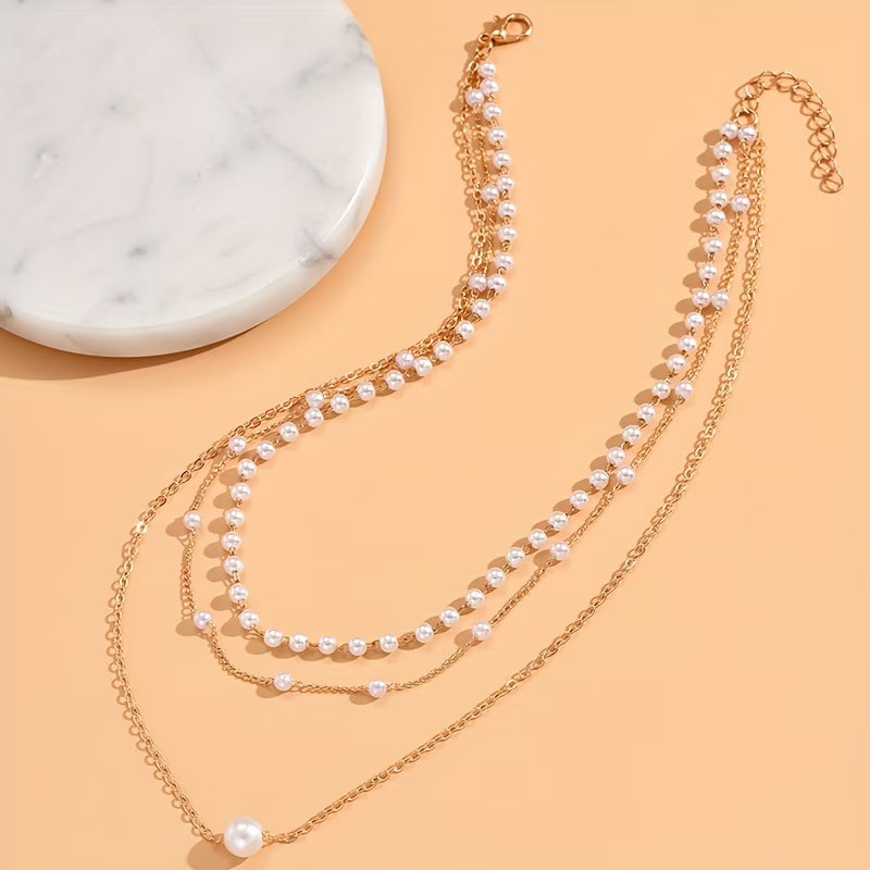 Το σετ κολιέ Trinity Pearl Layer